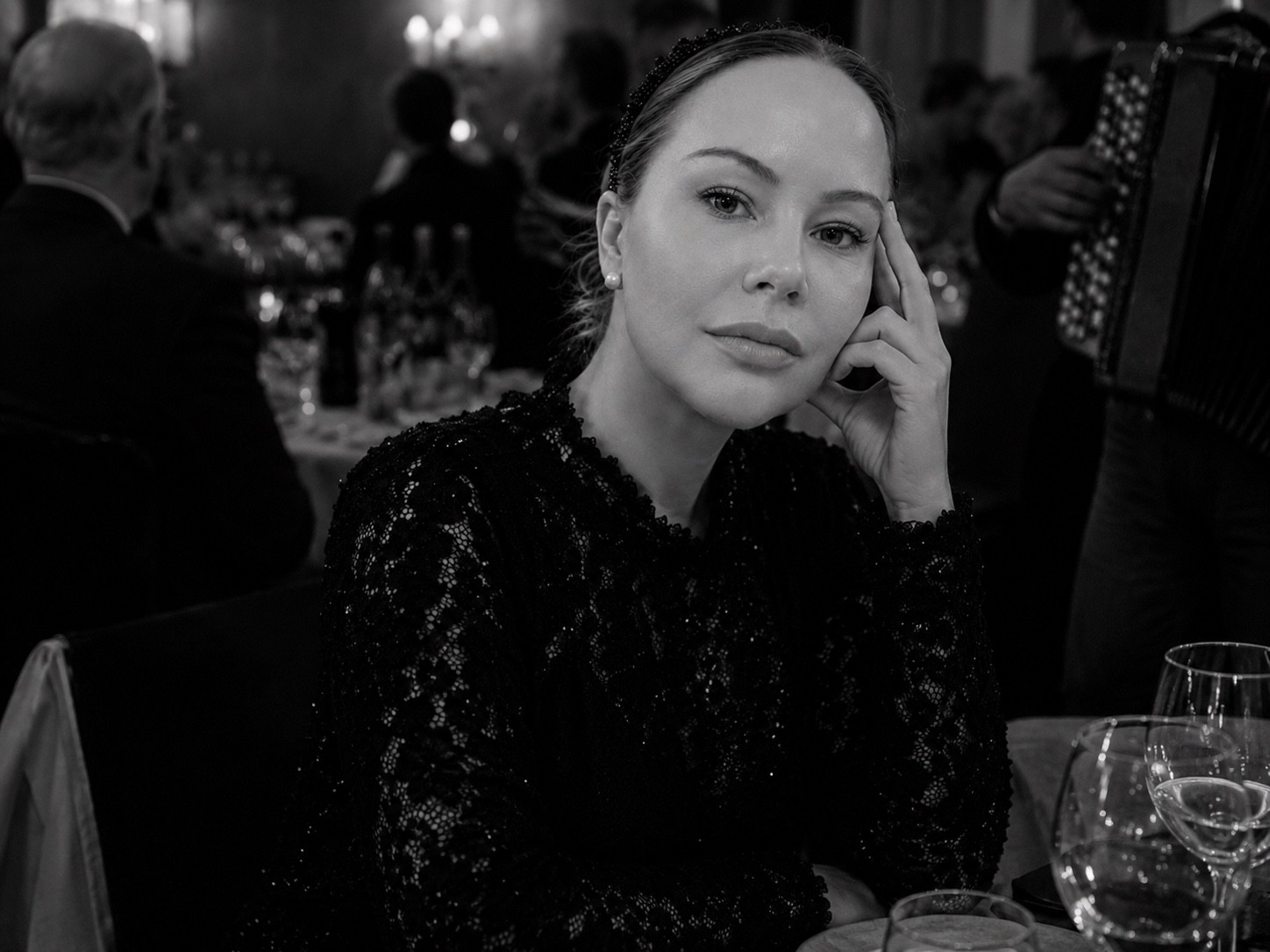 Black-and-white portrait at dinner